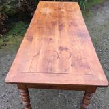 Old cherry farmhouse table with 3 drawers and turned legs