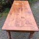 Old cherry farmhouse table with 3 drawers and turned legs