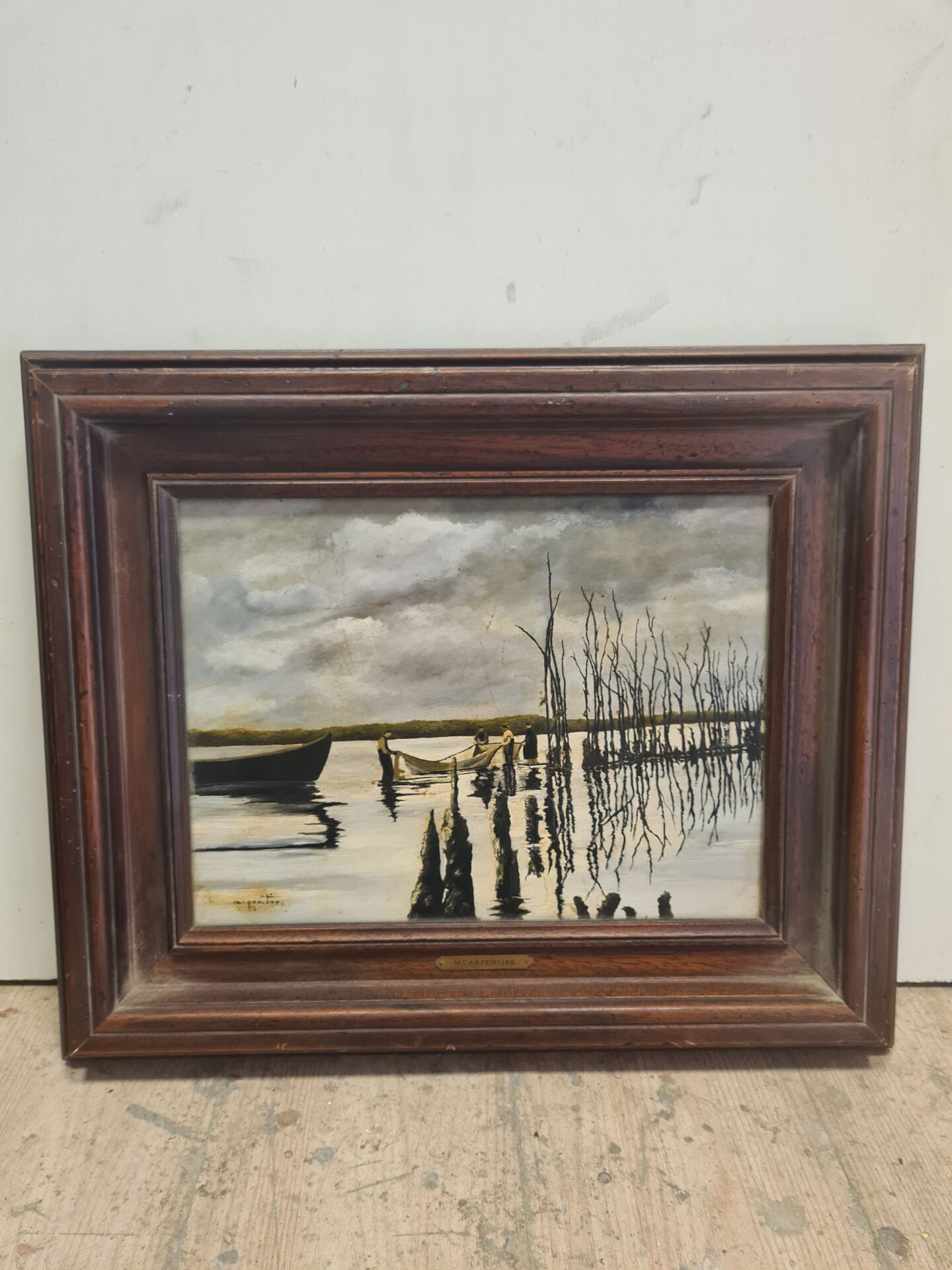 Landscape painting with a wooden frame