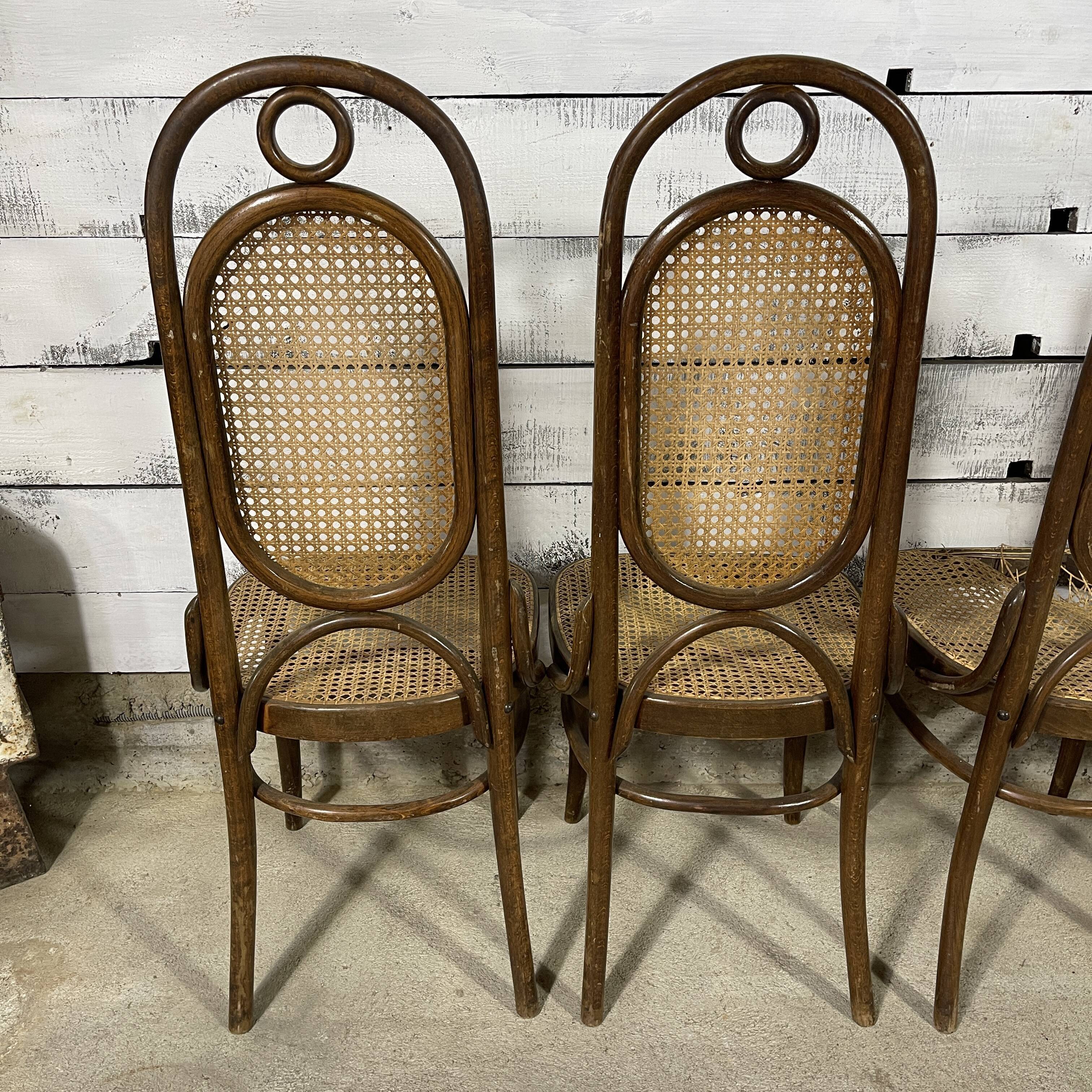 Series of 4 canned bistro chairs