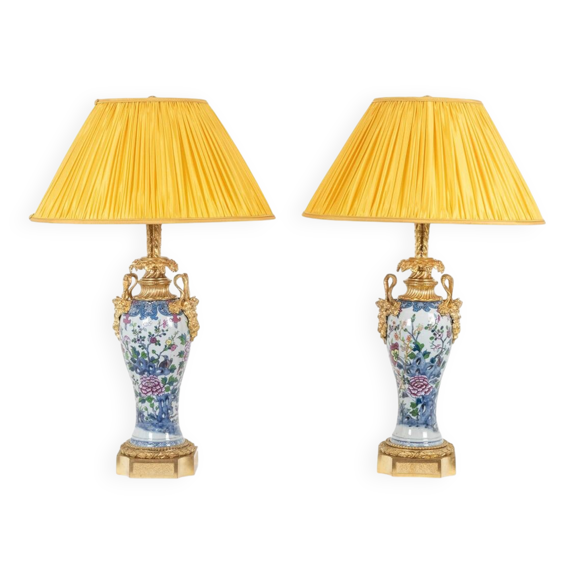 Pair of porcelain lamps decorated with bronze satyrs. Circa 1880.