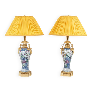 Pair of porcelain lamps decorated with bronze satyrs. Circa 1880.