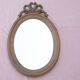 Oval mirror wood knot