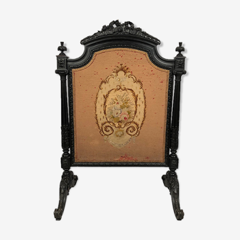 Richly carved blackened wooden fireplace screen, Napoleon III