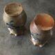Pair of vintage pottery vases with floral decoration and glaçureau sel