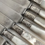 Antique table knives in mother-of-pearl and silver-plated metal