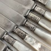 Antique table knives in mother-of-pearl and silver-plated metal