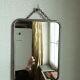 Vintage barber mirror with chain