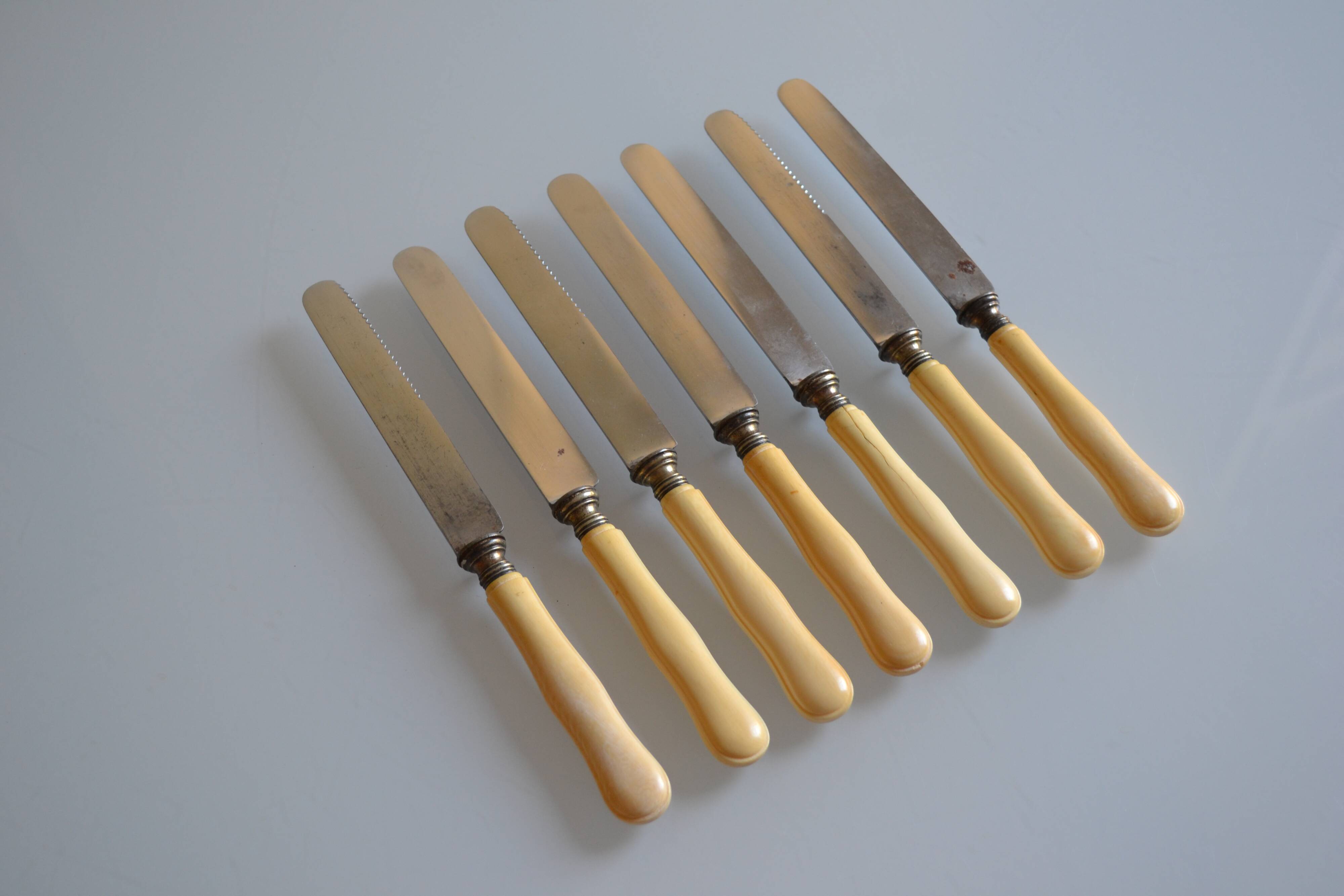 7 old table knives from the 19th century, monogrammed ivory-colored handles