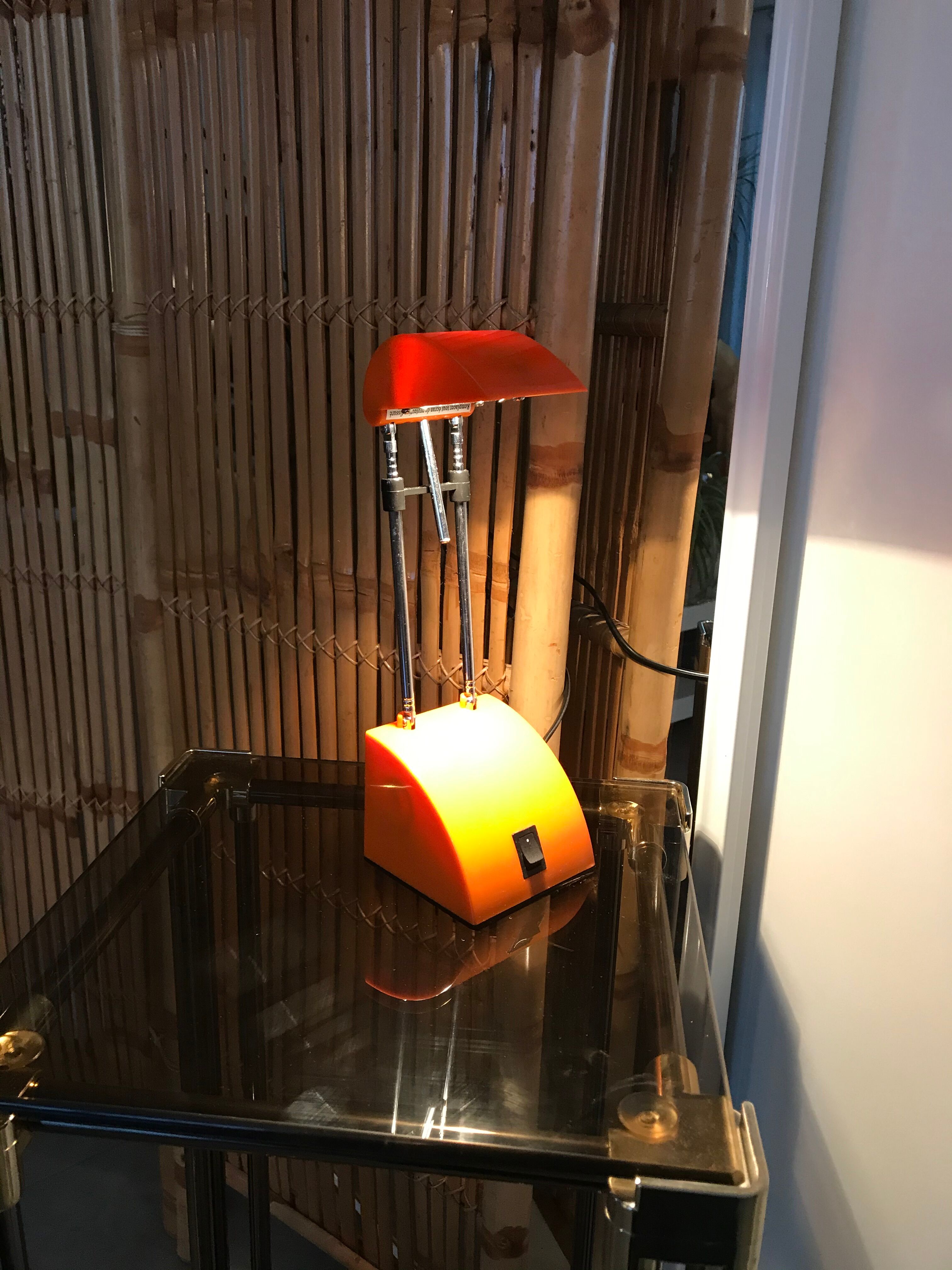 Orange telescopic desk lamp