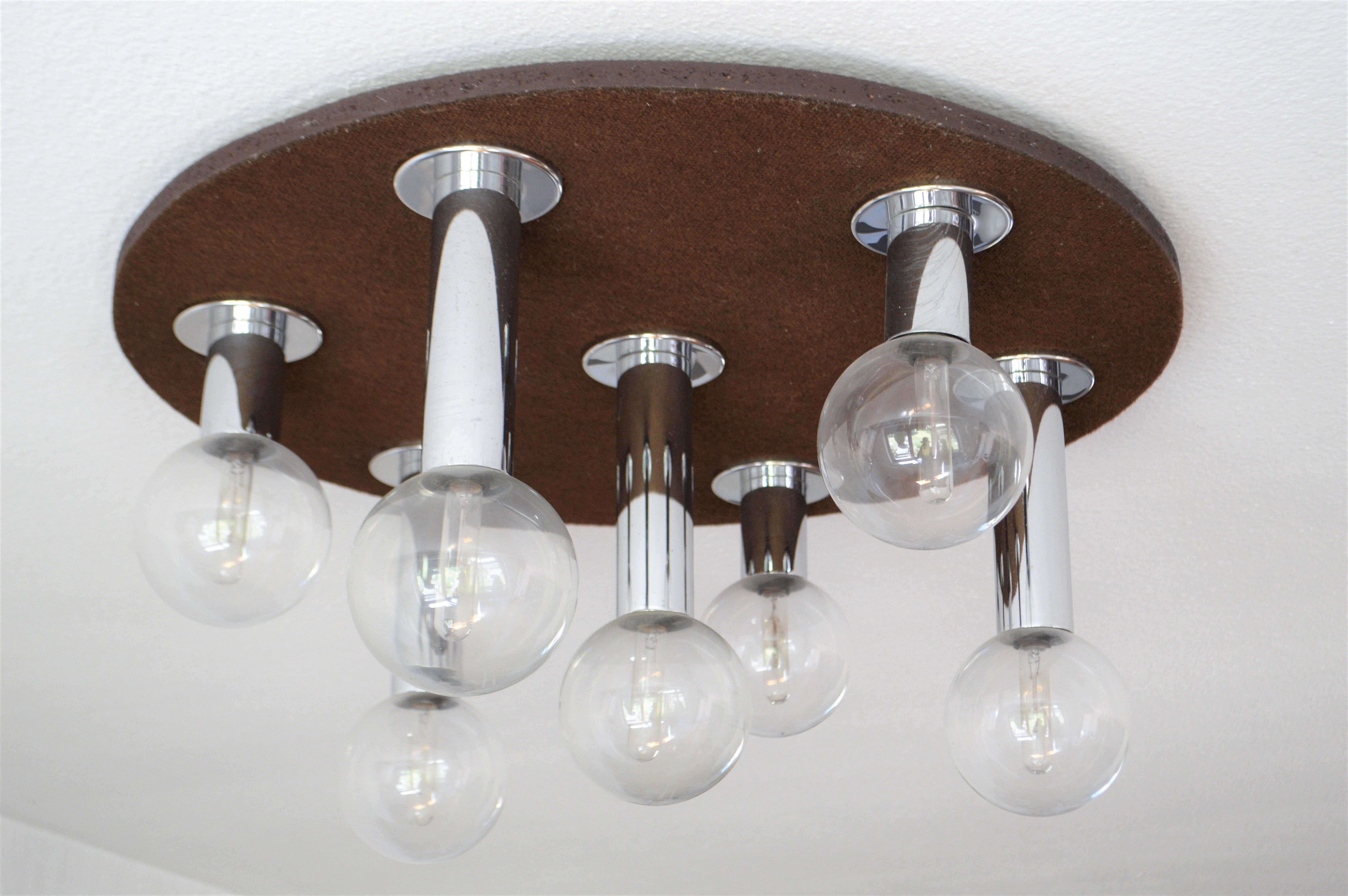 Vintage lamp of the 70s design in chrome glass space age