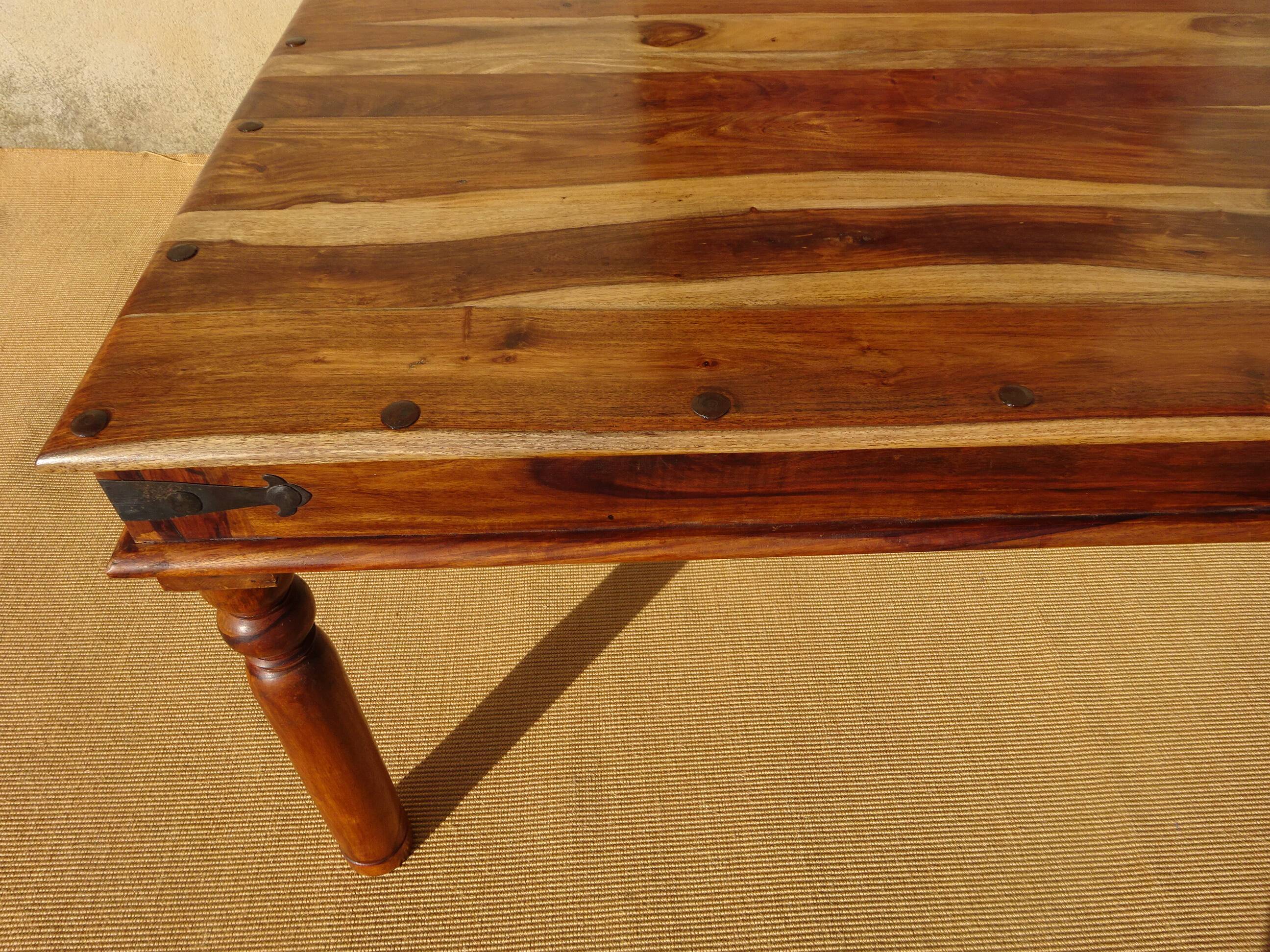 Solid wood and wrought iron table