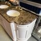 Classic double bathroom cabinet with marble top and gold fittings