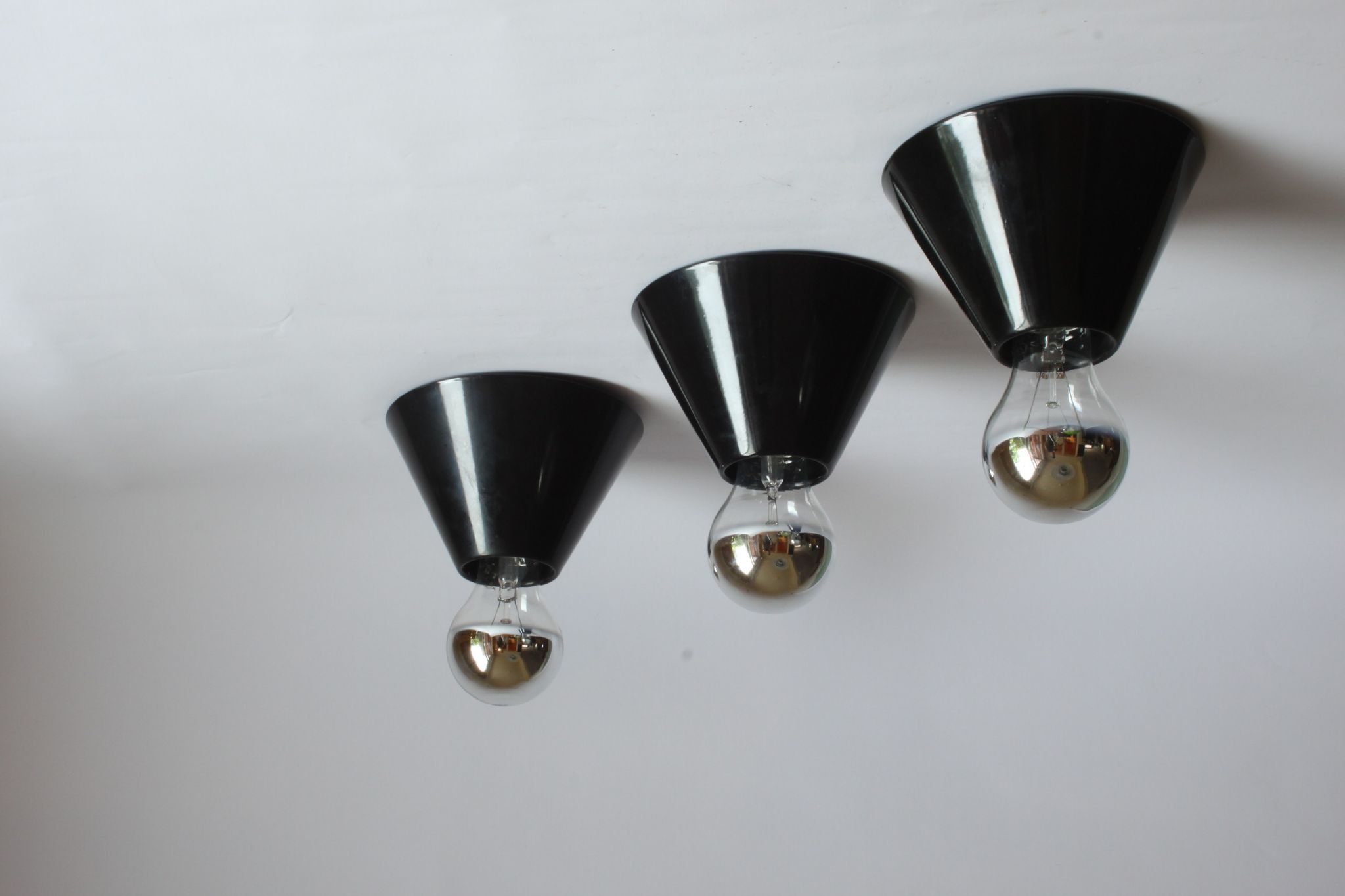 Black cone ceiling lights "Jolly" by Bruno Celupica for Tronconi, Italy 1970s, set of three.