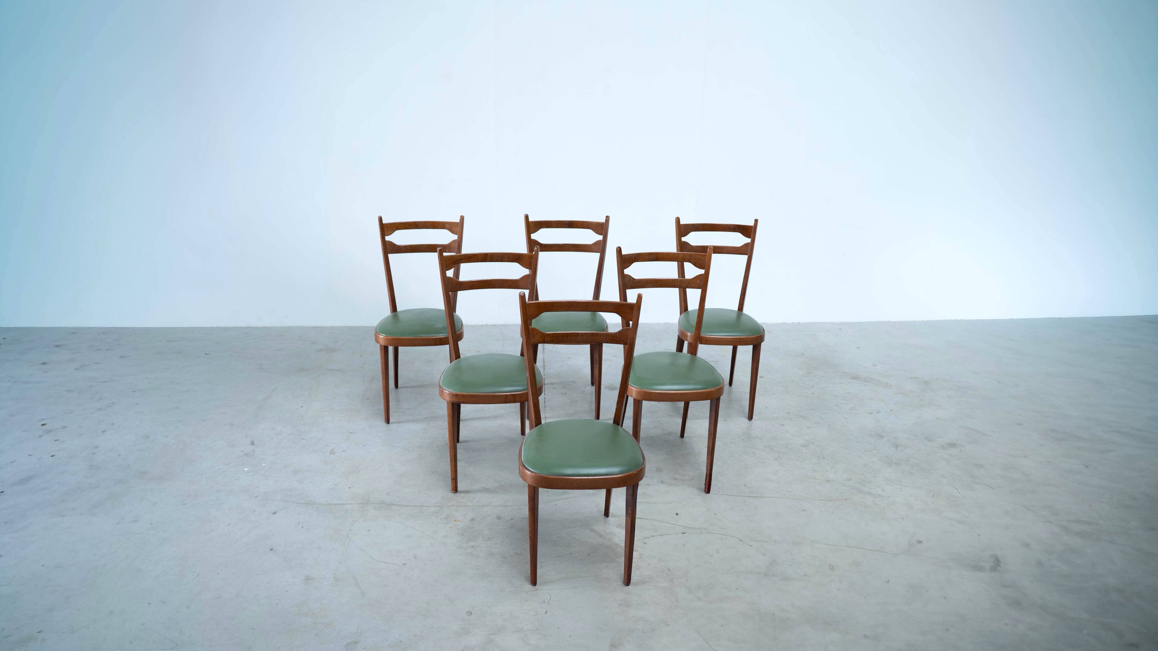 Set of six elegant Italian dining chairs