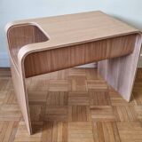Boone coffee table in curved wood produced by Habitat, design