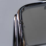 Coffee table with smoked glass top in chromed frame