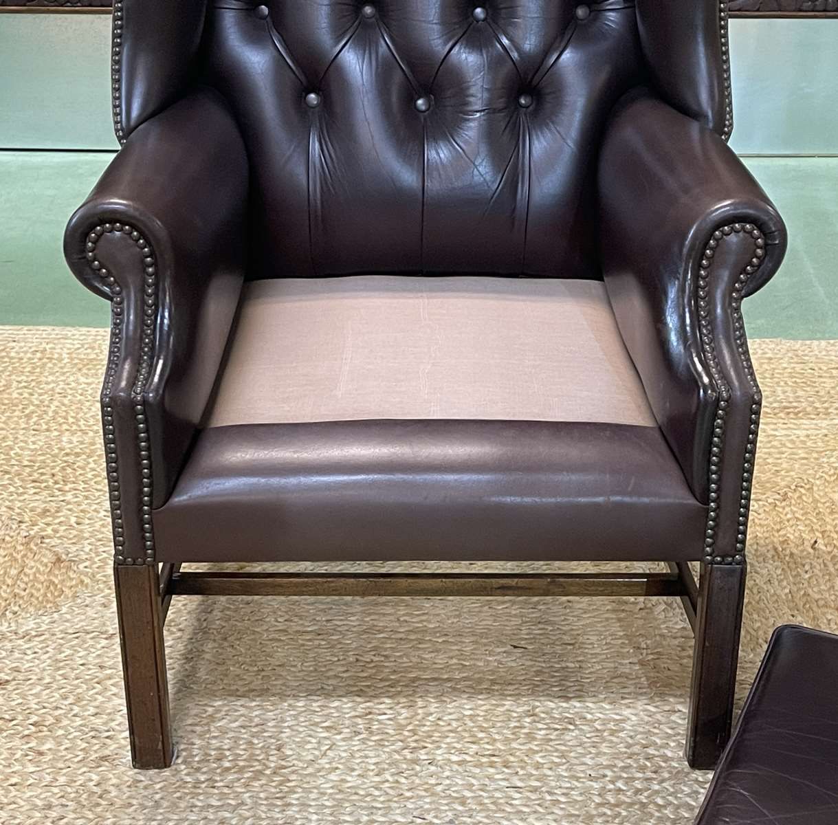 Chesterfield armchair with brown leather ears from the 1990s in very good condition