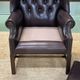 Chesterfield armchair with brown leather ears from the 1990s in very good condition
