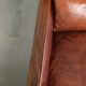 Sheepskin Art Deco design armchair with a comfortable seat and warm colours