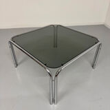 Space coffee table from the 70s, tubular metal and vintage smoked glass