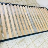 Old white metal and brass bed