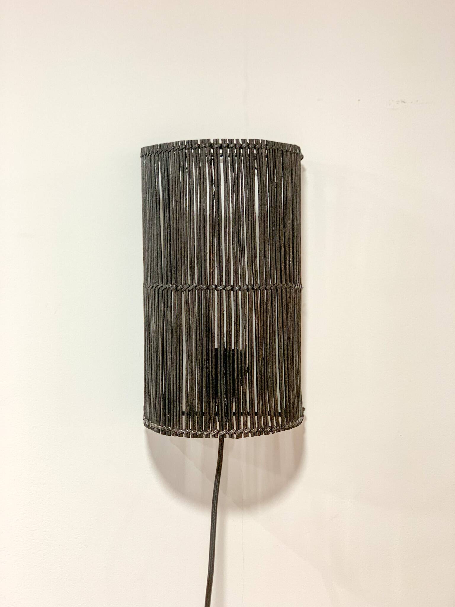 Black rattan wall light