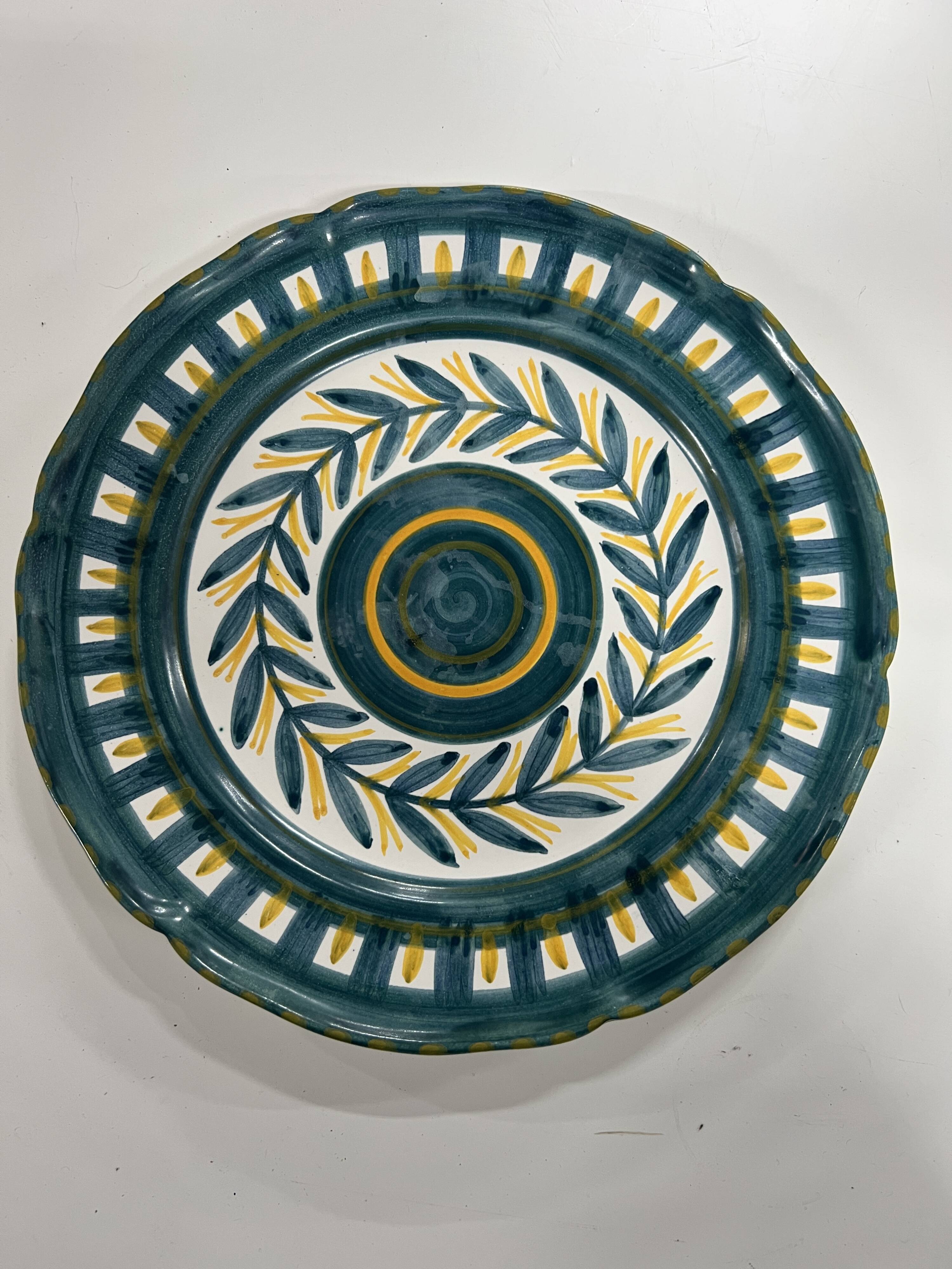 Painted and enamelled ceramic plate