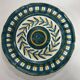 Painted and enamelled ceramic plate