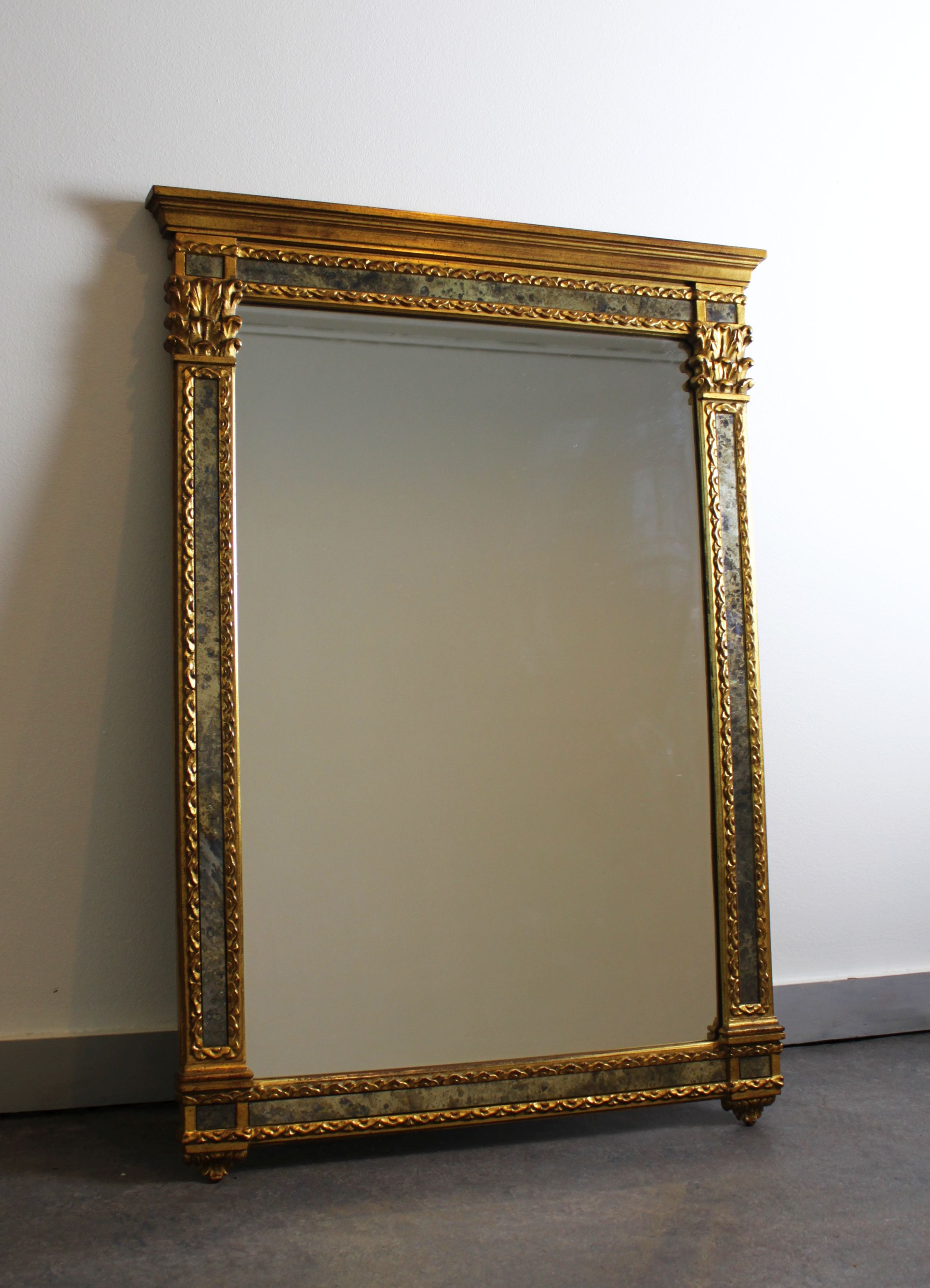 Mirror with parecloses, Regency style.