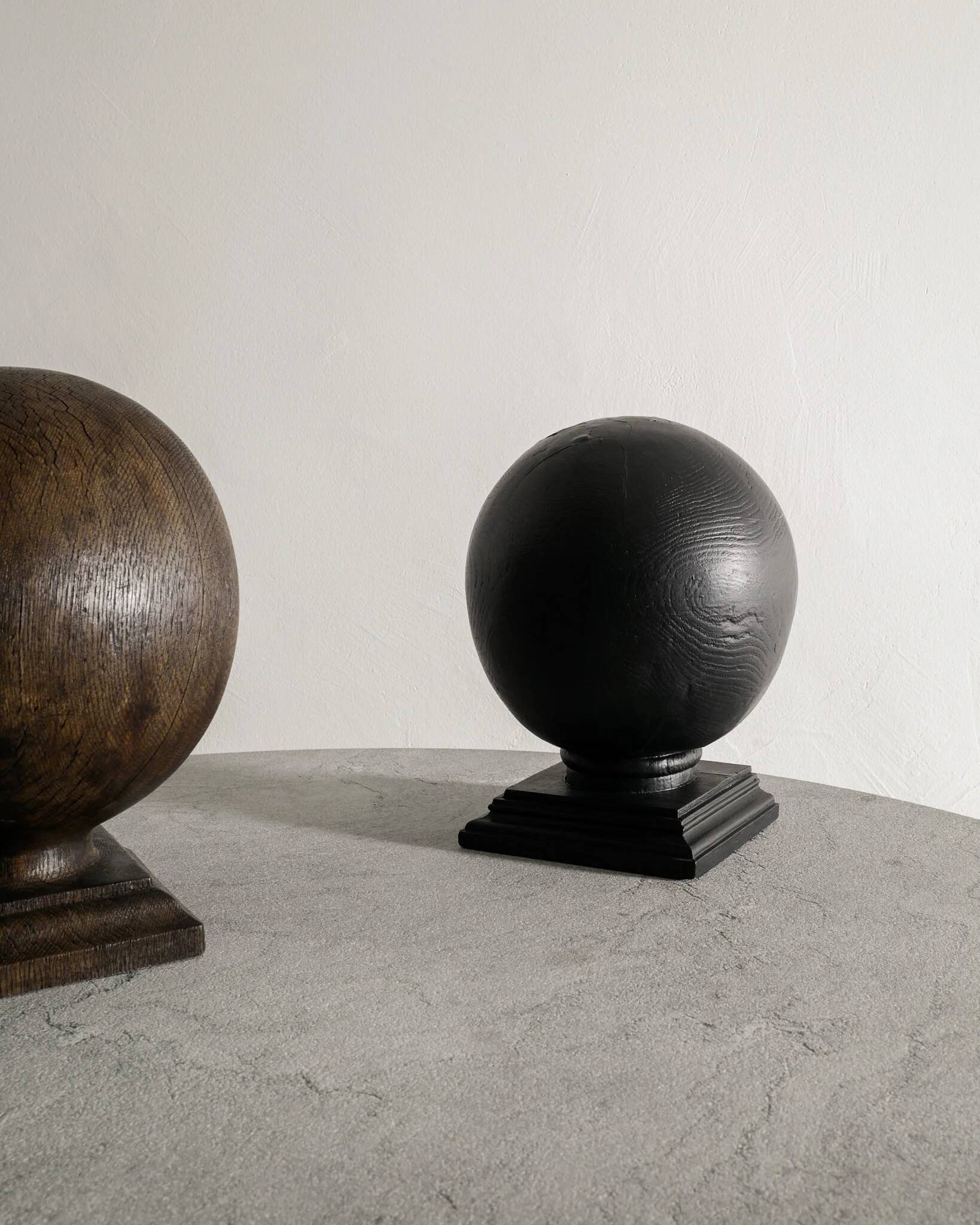 Pair of Vintage Black & Brown Round Wooden Sculptures