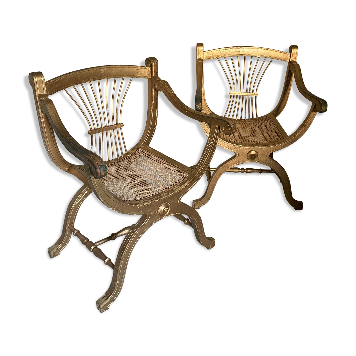 Pair of canework golden armchairs