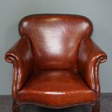 Old armchair in sheep leather