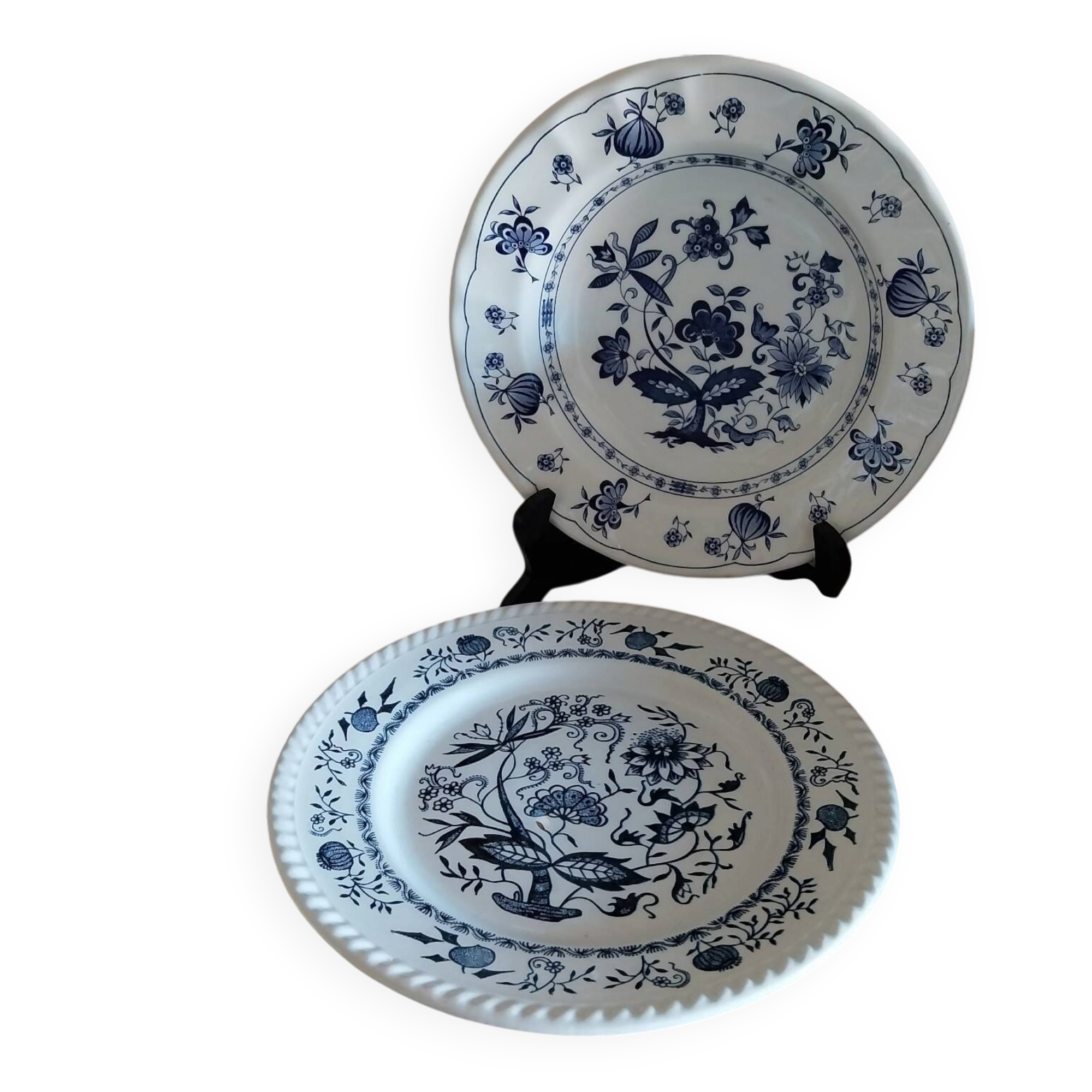 Old plates with blue floral decoration.