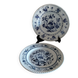 Old plates with blue floral decoration.