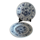 Old plates with blue floral decoration.