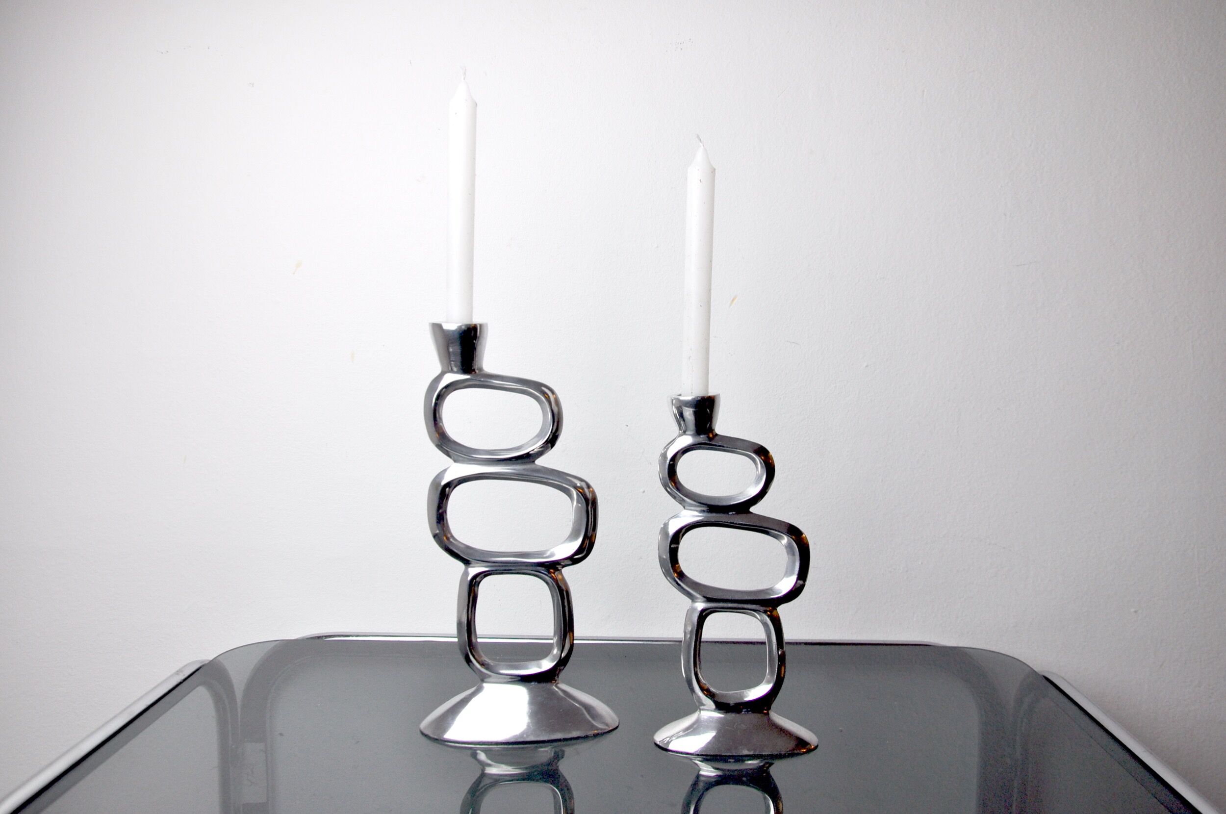 Pair of circle candlesticks by Matthew Hilton, England, 1980