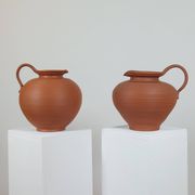 Pair of handcrafted terracotta vases from the mid-century.