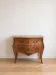 Commode Louis XV en bois de rose et marqueterie