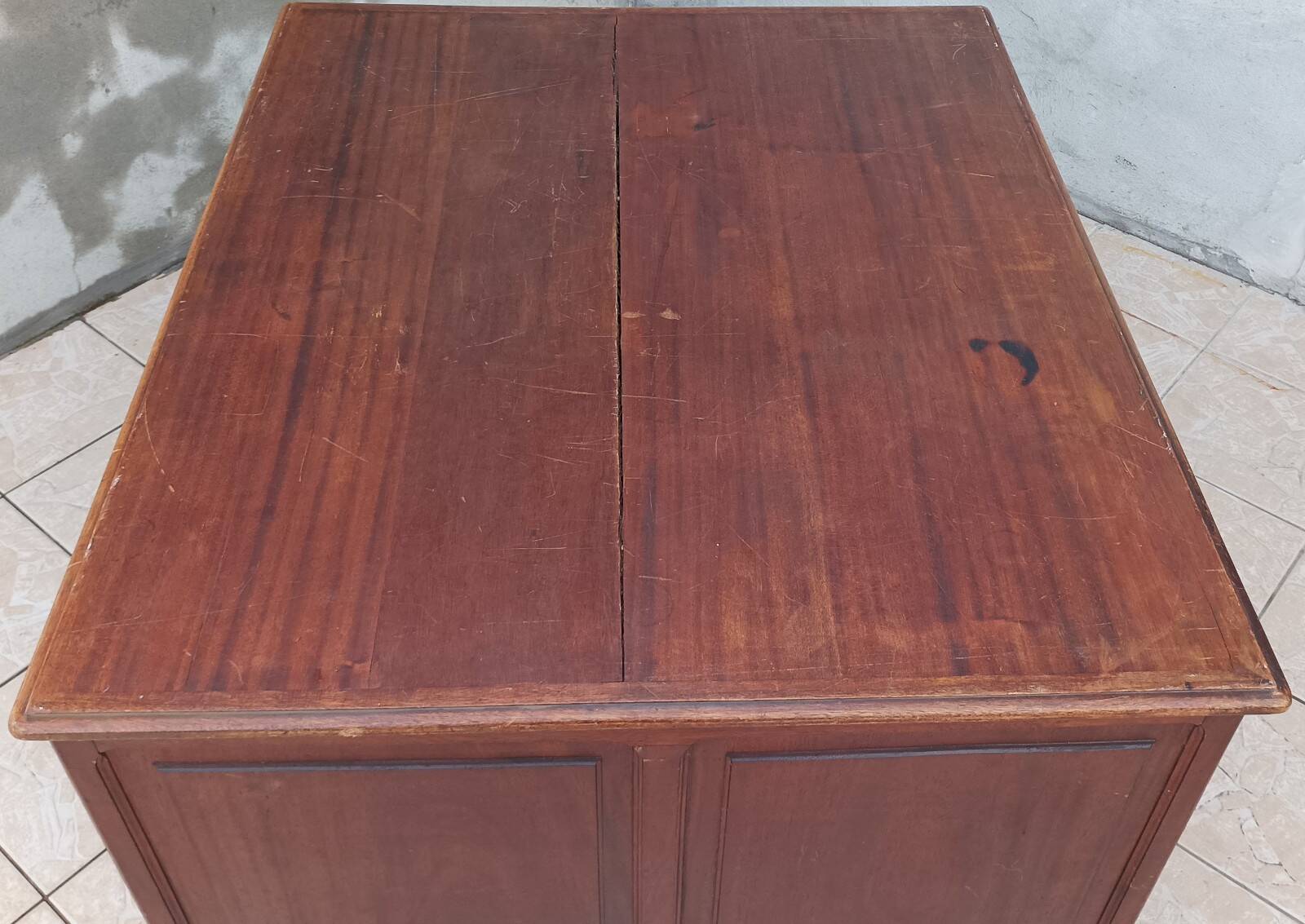 Vintage double-sided mahogany desk with 18 drawers.