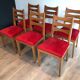 Suite de 6 chaises en chêne et assises de velours rouge