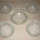 Lot salad bowl and 4 cups in pressed molded glass