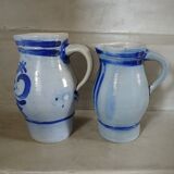 2 antique stoneware pitchers