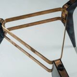 Triangular coffee table in the manner of Alfred Hendrickx