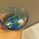 Two small candle holders in blue glass from the well-known Finnish company Ittala.