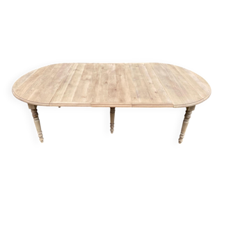 Renovated Louis Philippe round extendable dining table with 3 leaves.