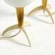 Two Mid-Century Modern rocket table lamps in brass and glass