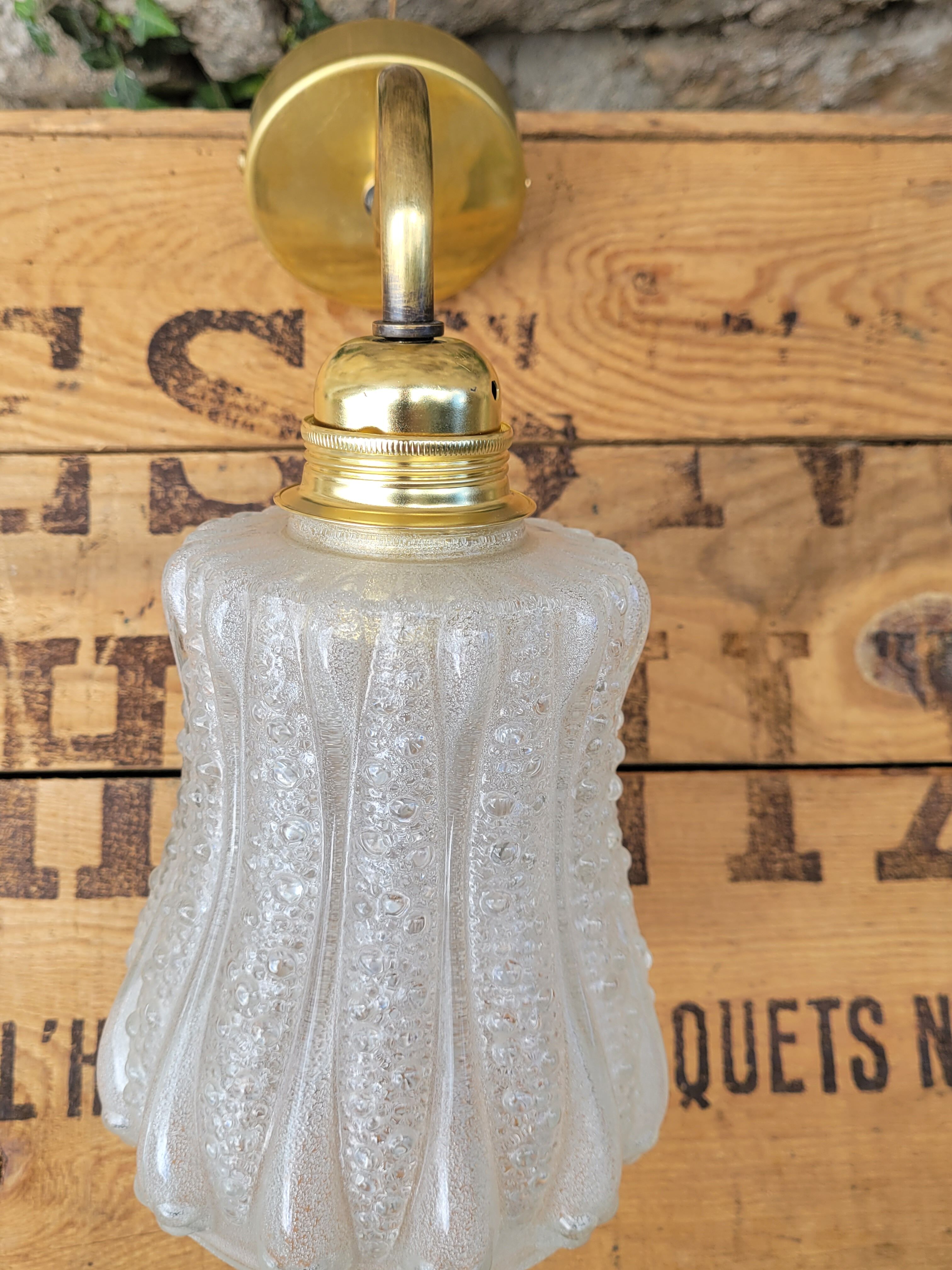 Brass and moulded glass sconce
