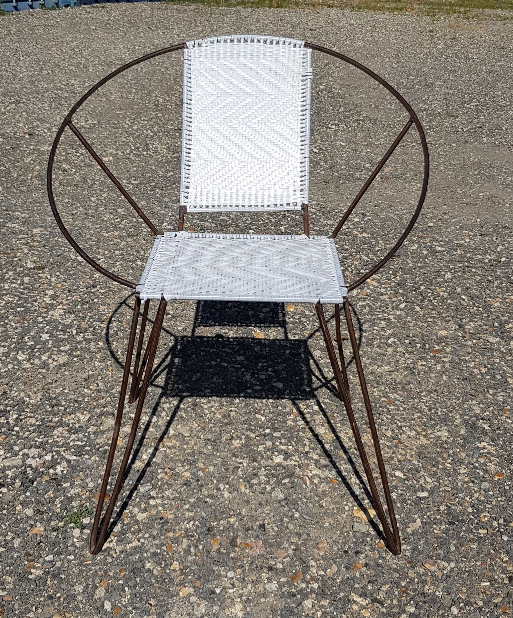 Vintage black metal armchair