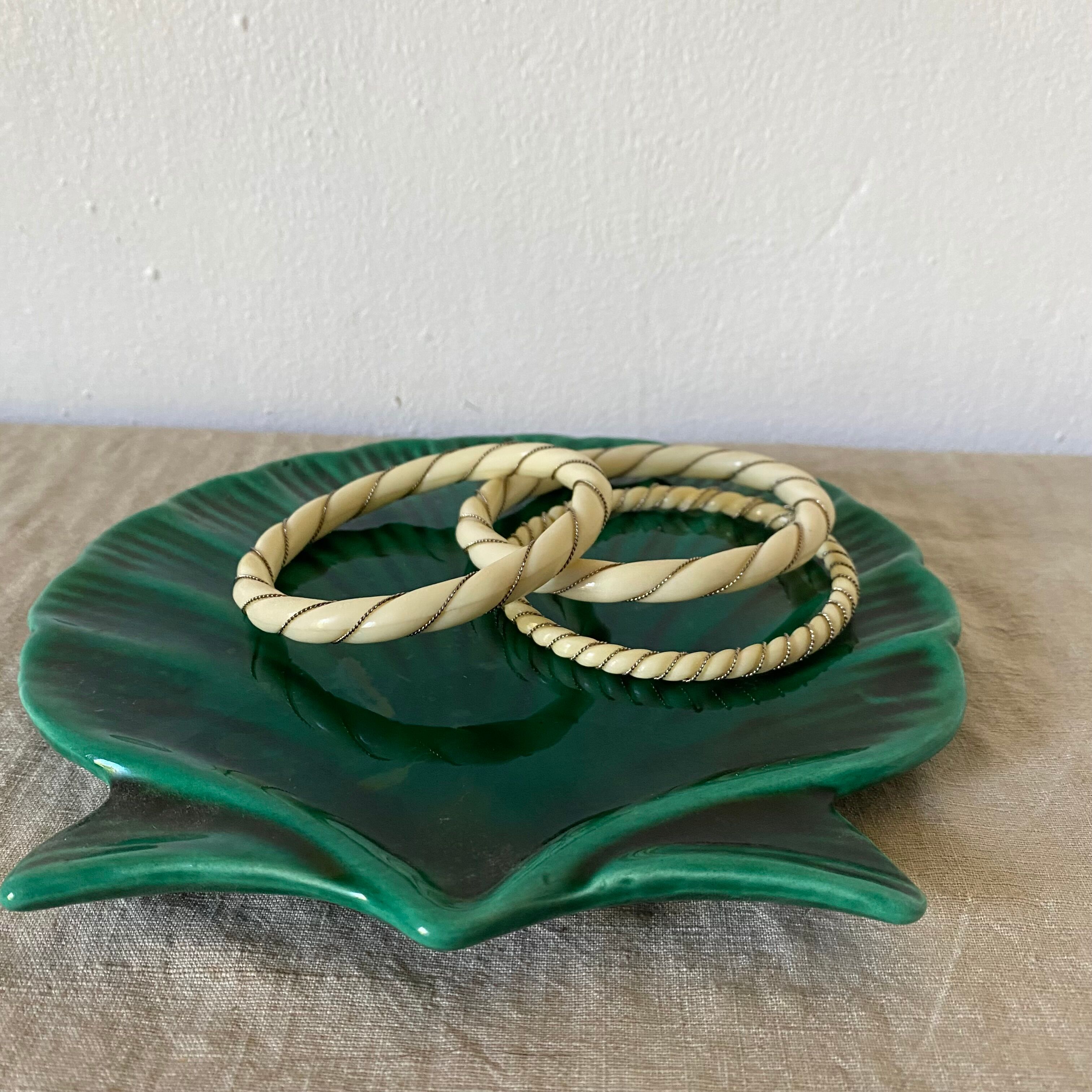 Empty ceramic pocket scallop shell